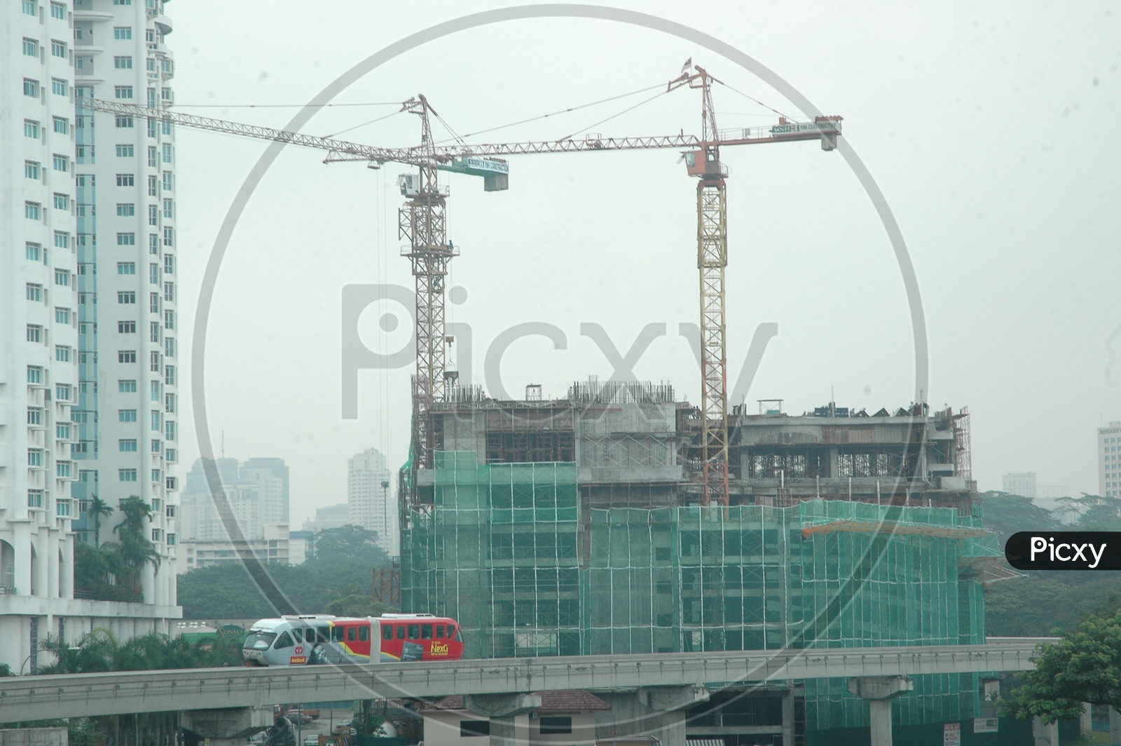 Tower Cranes alongside the construction of hi rise buildings