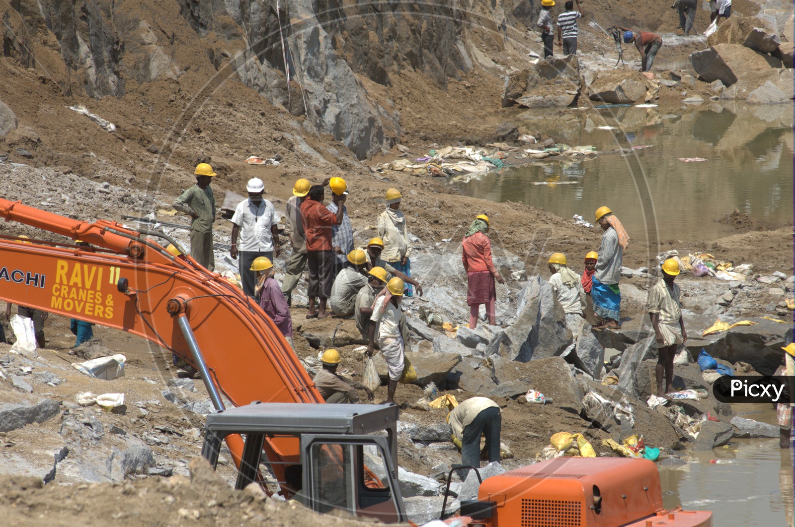 Labourers working in an excavation site