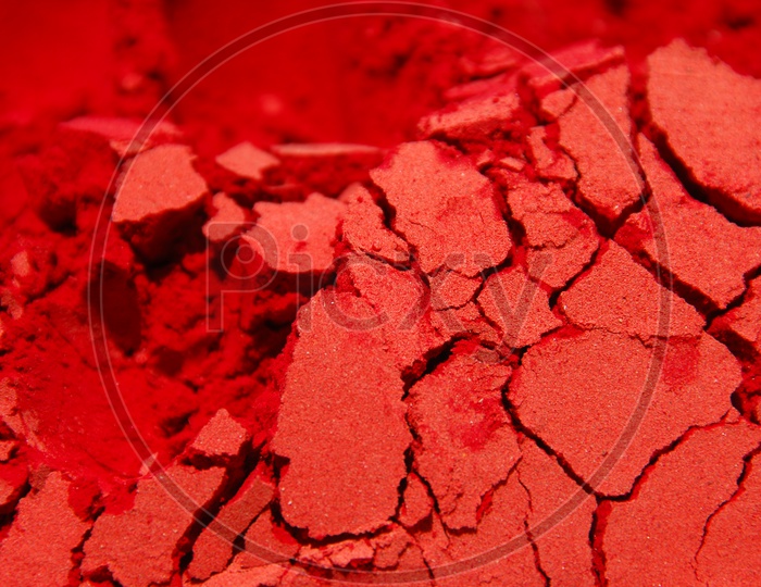 Red Rangoli colour layer patterns