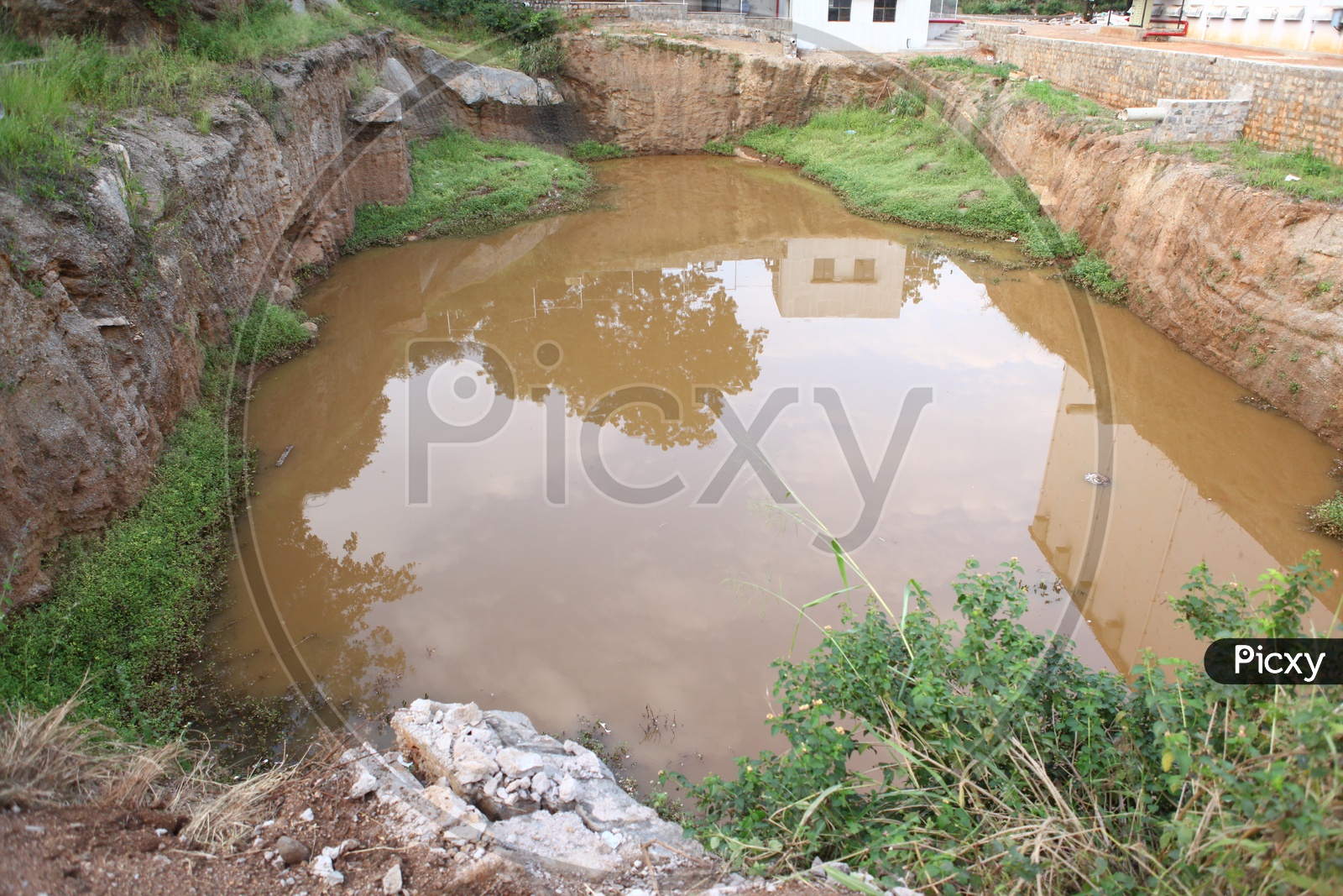Excavated area filled with water