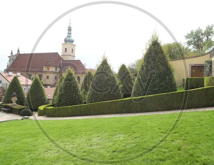 Green Lawn and trees alongside the monastery