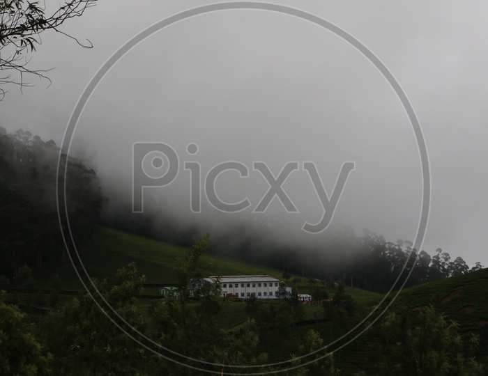 Houses in the Valleys of Ooty With Fog all Around