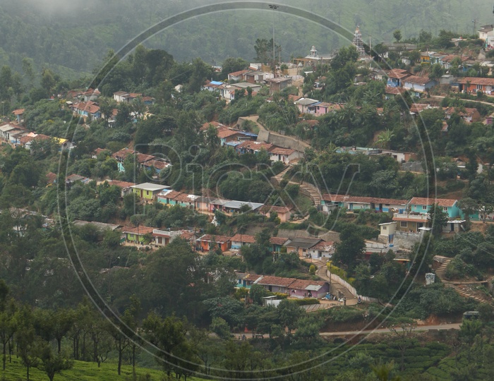 Aerial View of Tea Plantations and Houses on Hill Sides Of Ooty
