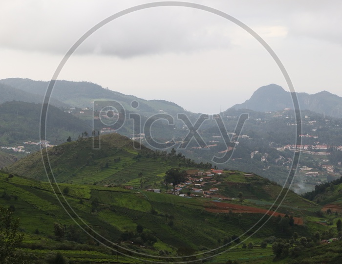 Tea Plantations and houses in Ooty Aerial View from a Hill Top