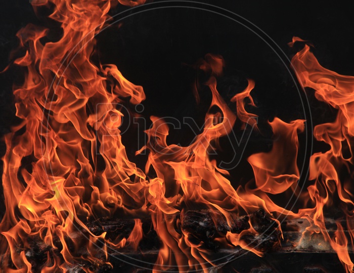 Photograph of Huge Fire flames on  black background