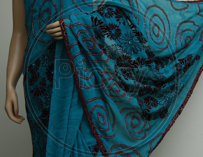 Photograph of blue colour saree