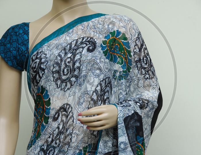 Close up shot of a Mannequin draped in a traditional Indian saree