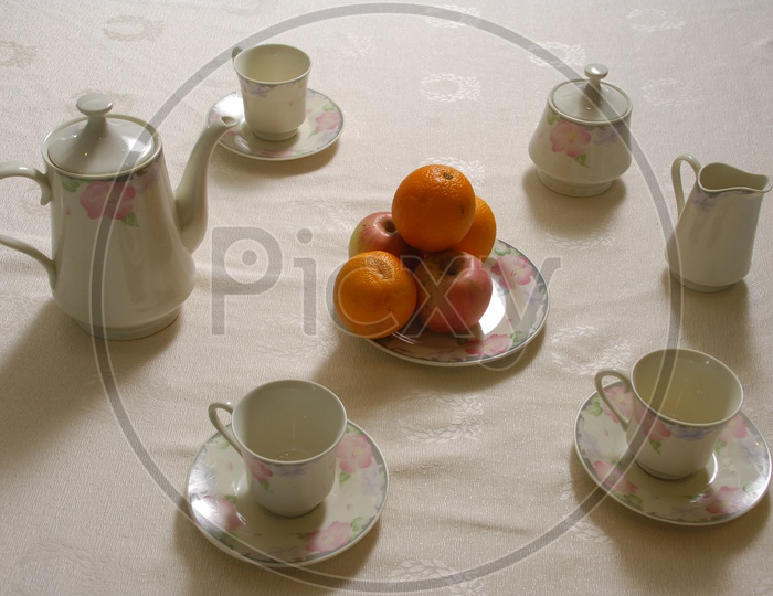 Orange fruits placed in a plate on Dining Table