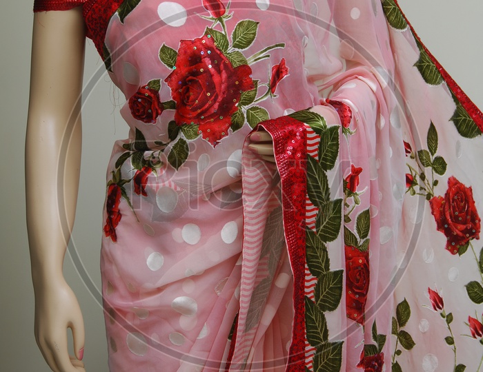 Close up shot of pink coloured saree