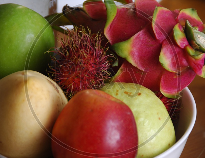Close up shot of fruits in a bowl