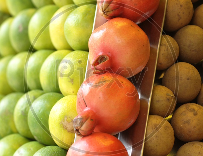 Close up shot of pomegranate and Orange fruits