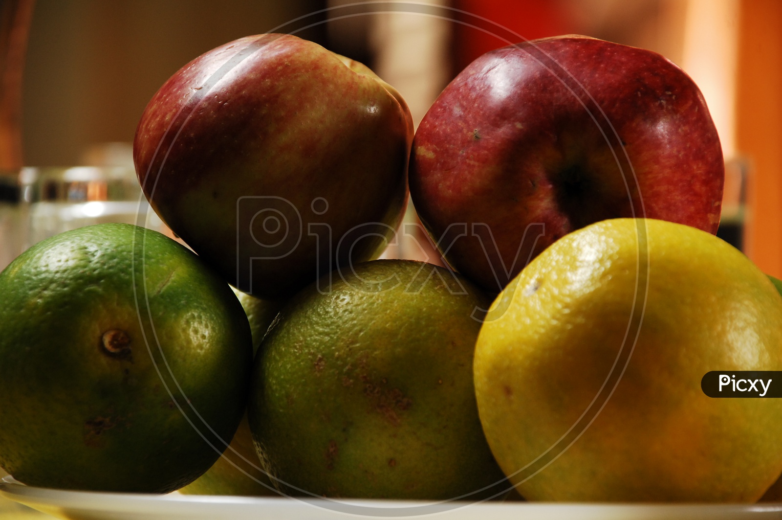 Close up shot of Apple and Orange Fruits
