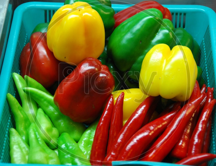Indian Chilli , Capsicum or Bell Pepper  in a Basket