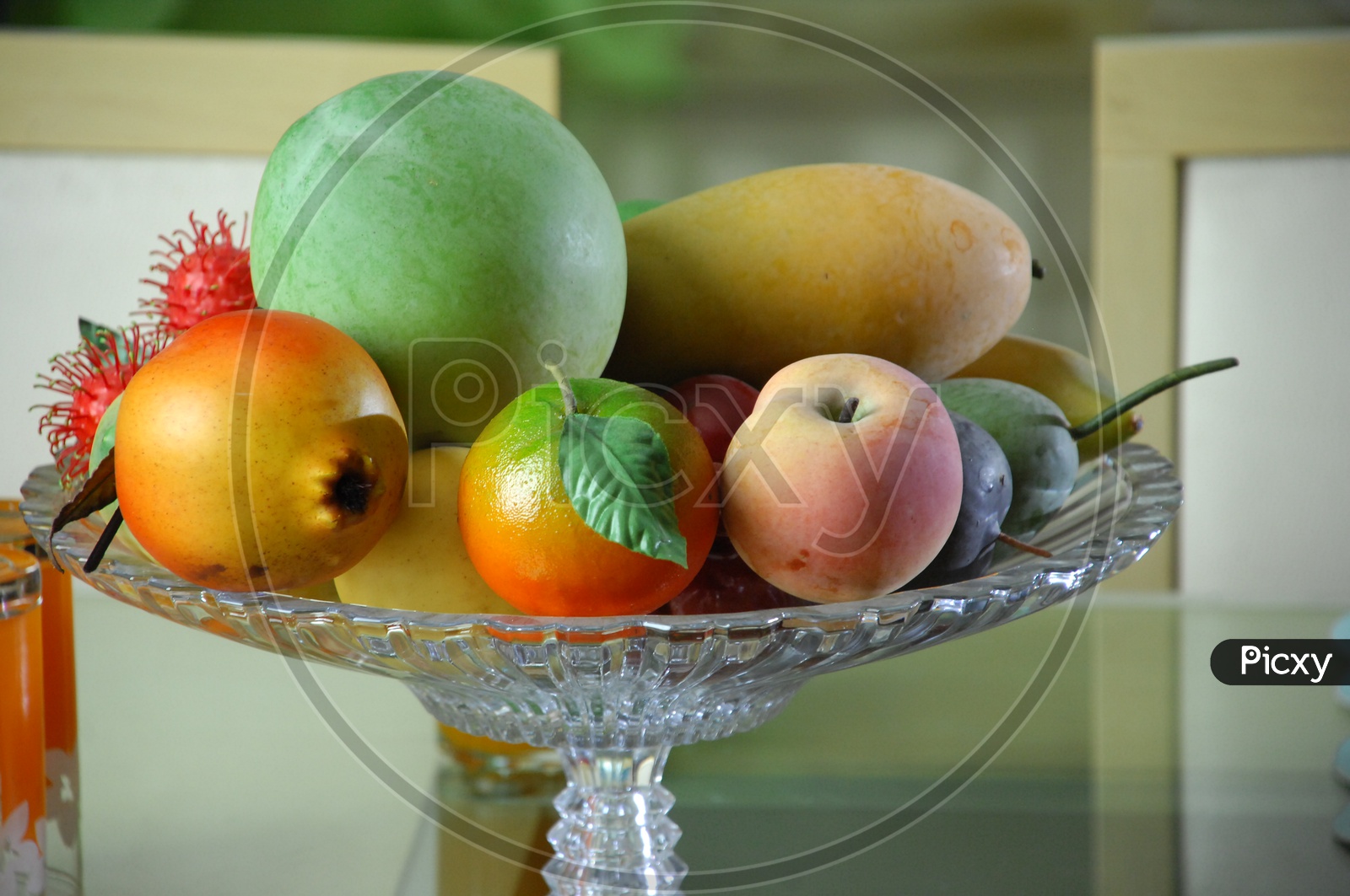 Close up shot of fruits in glass bowl