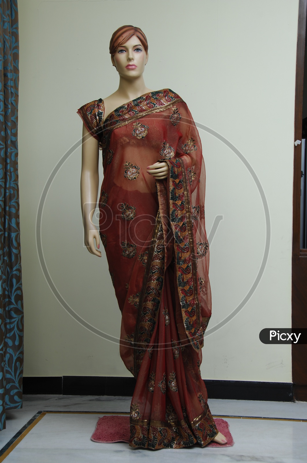 Photograph of red colour saree