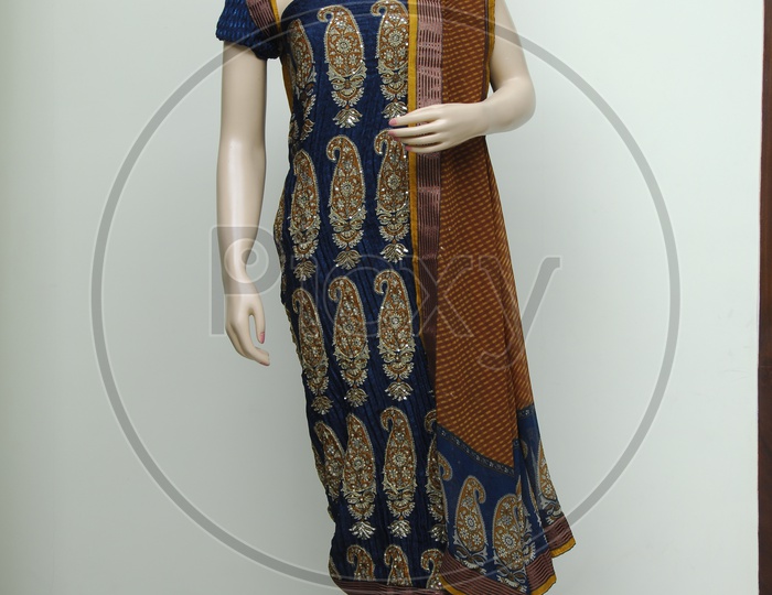 Mannequin draped in a printed salwar suit