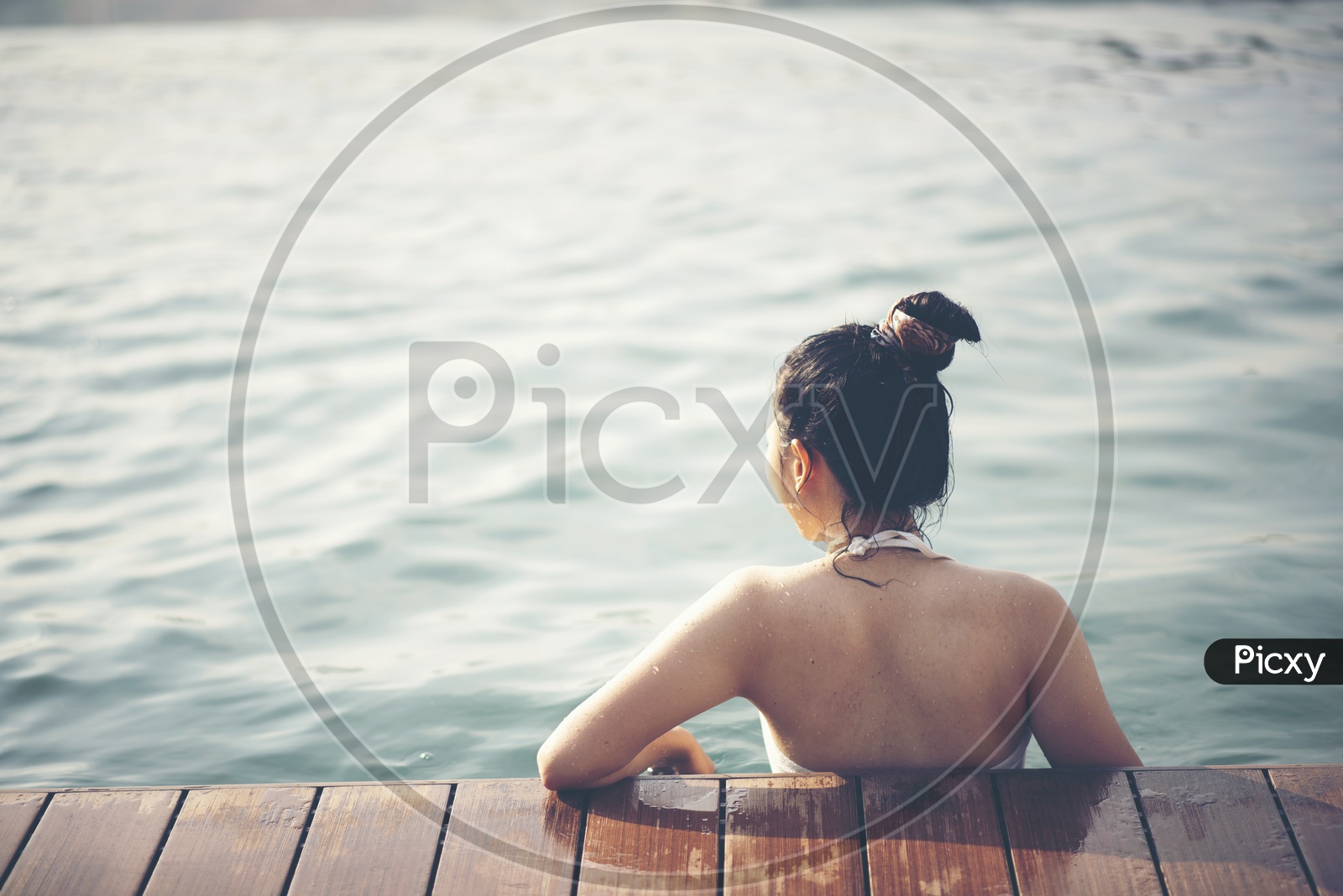 An Asian Woman On a Swimming pool