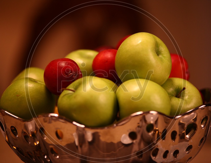 Fruits In a Basket Over Dining Table