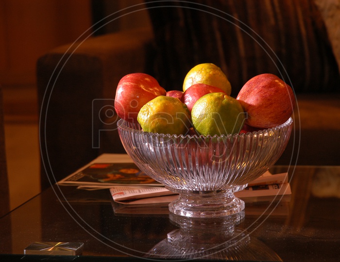 Photograph of Fruits in a glass bowl