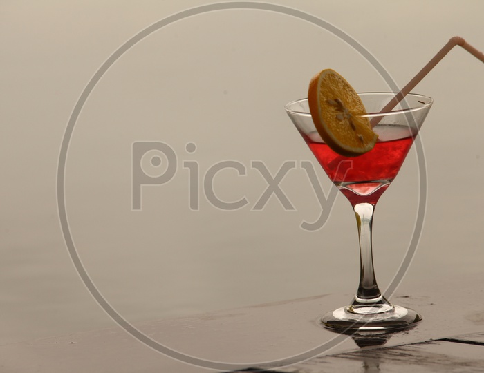 Mocktail garnished with a slice of lemon