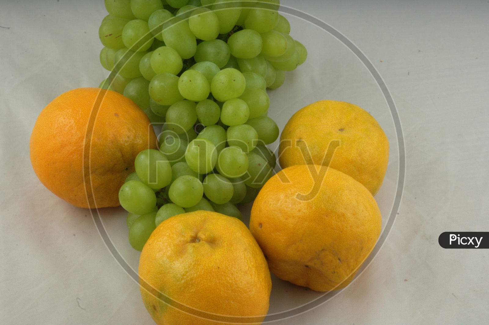Citrus Fruit or Sweet Lemon and Grapes