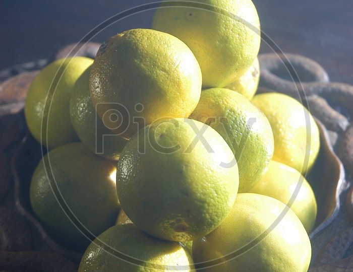 Close up shot of Orange fruits in a Bowl