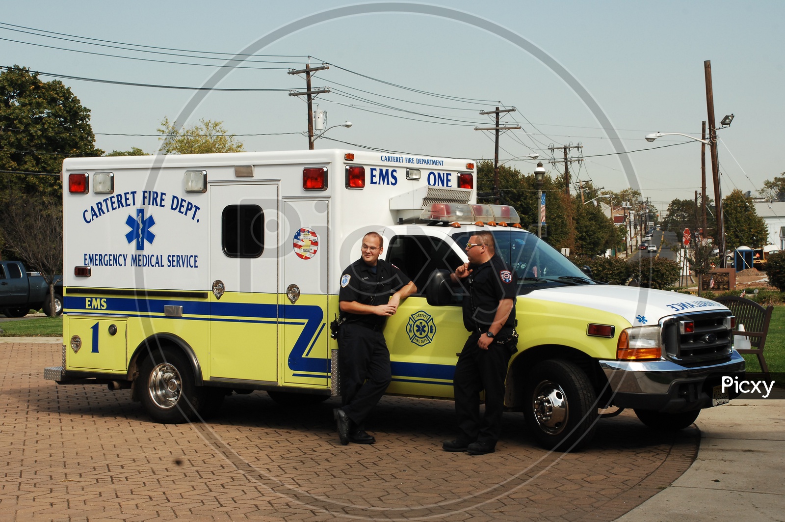 Security Guards standing at the ambulance