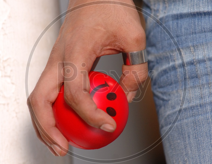 Man Squeezing stress ball
