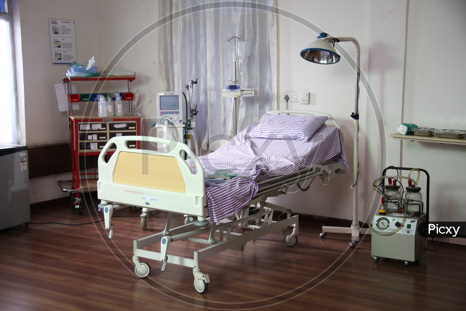 Patient recovery bed with medical equipments in a hospital