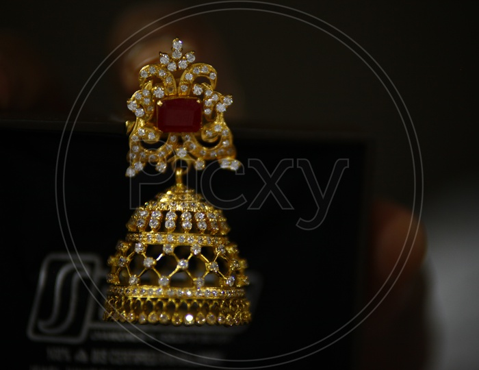 Bridal look women  gold Earrings with red Emerald & pearls