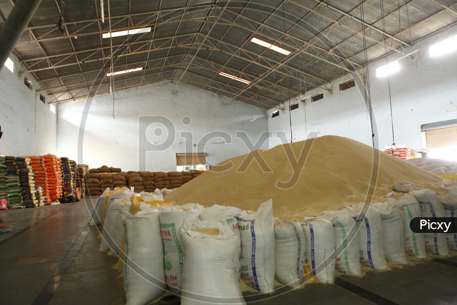 Image Of A Big Rice Heap Lined With Rice Bags In A Godown Of A Rice Mill Ak792280 Picxy 3743