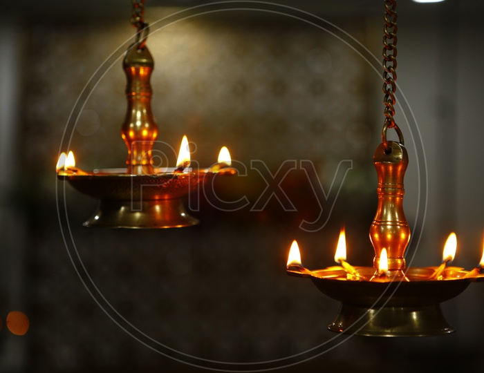 Traditional oil lamp with flame in a wedding