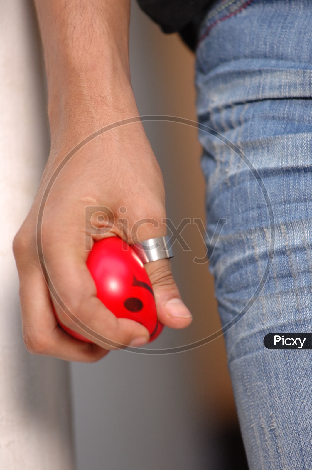 Man Squeezing stress ball