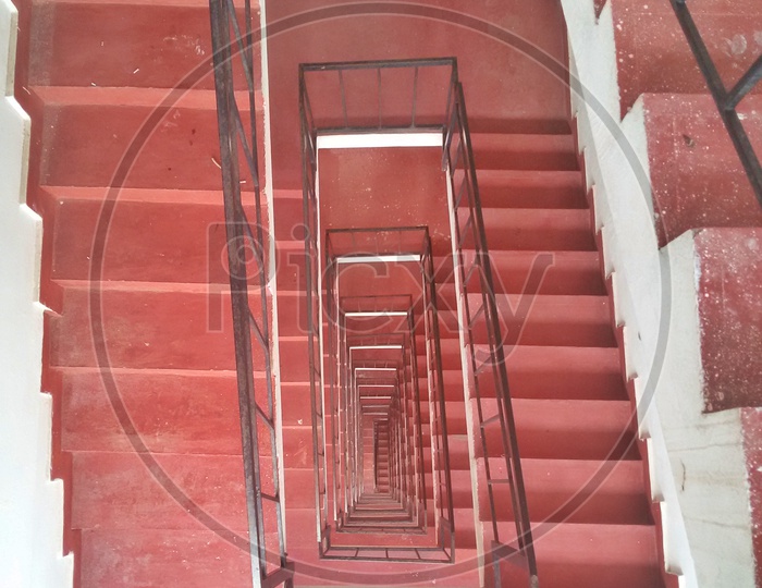 A red spiral staircase