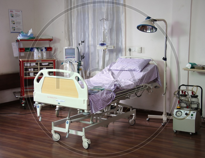 Patient recovery bed with medical equipments in a hospital