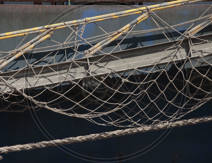 Net alongside the ship at a port area