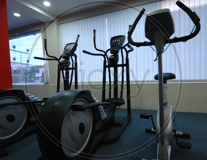 Fitness and strengthening equipment in the gym - Cycles
