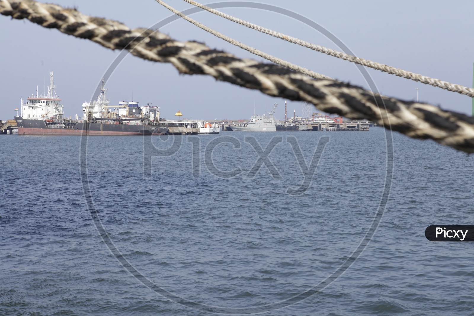 Ships Anchored At Port Berths
