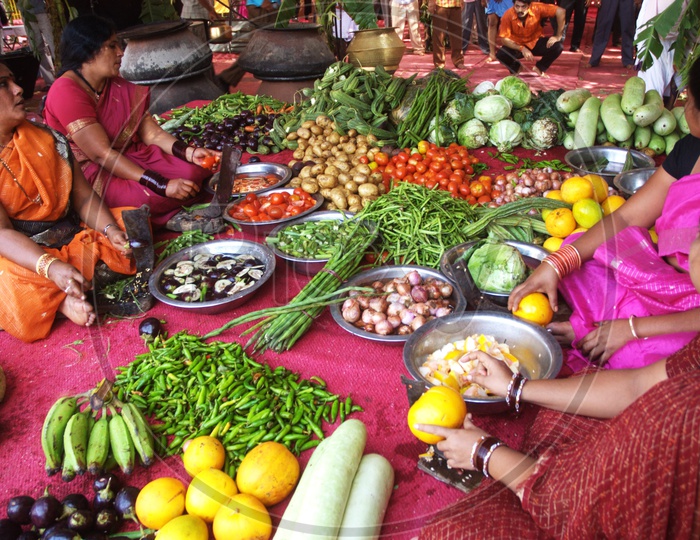 Group of women with various vegetables