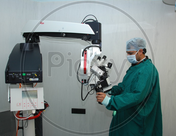 Doctor Working with Medical Lab Manipulator