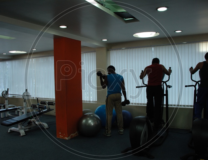 Indian men exercising at a fitness centre