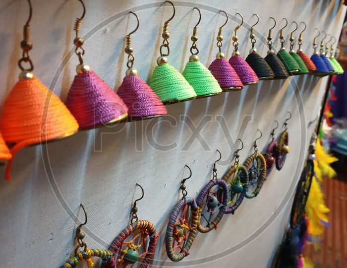 Colorful earrings for sale at a local shop