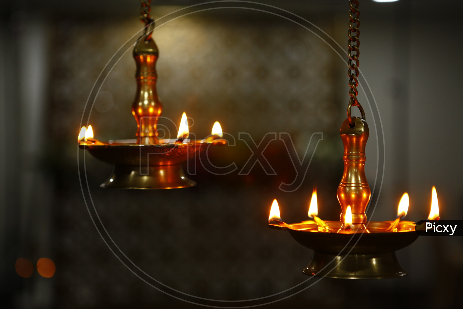 Traditional oil lamp with flame in a wedding