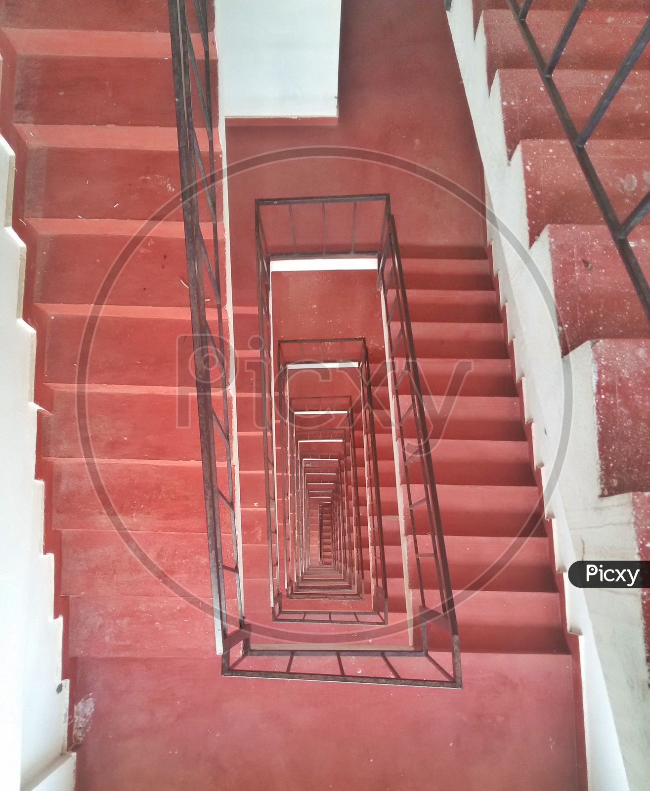 A red spiral staircase