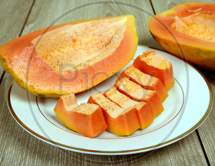 Pieces of  fresh Seedless  Papaya in a dish