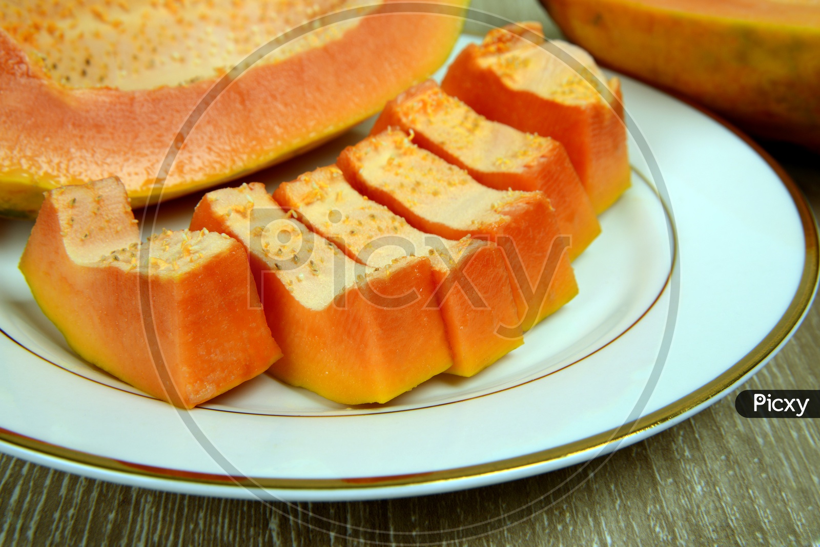 Pieces of  fresh Seedless  Papaya in a dish