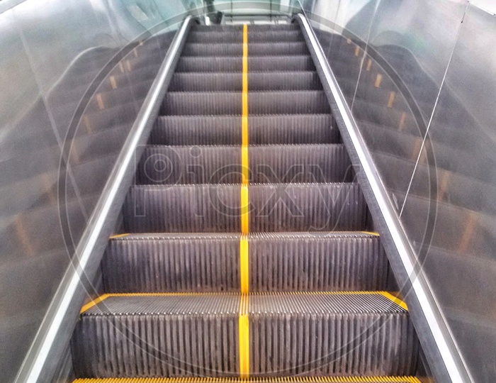 Symmetric photo of an escalator
