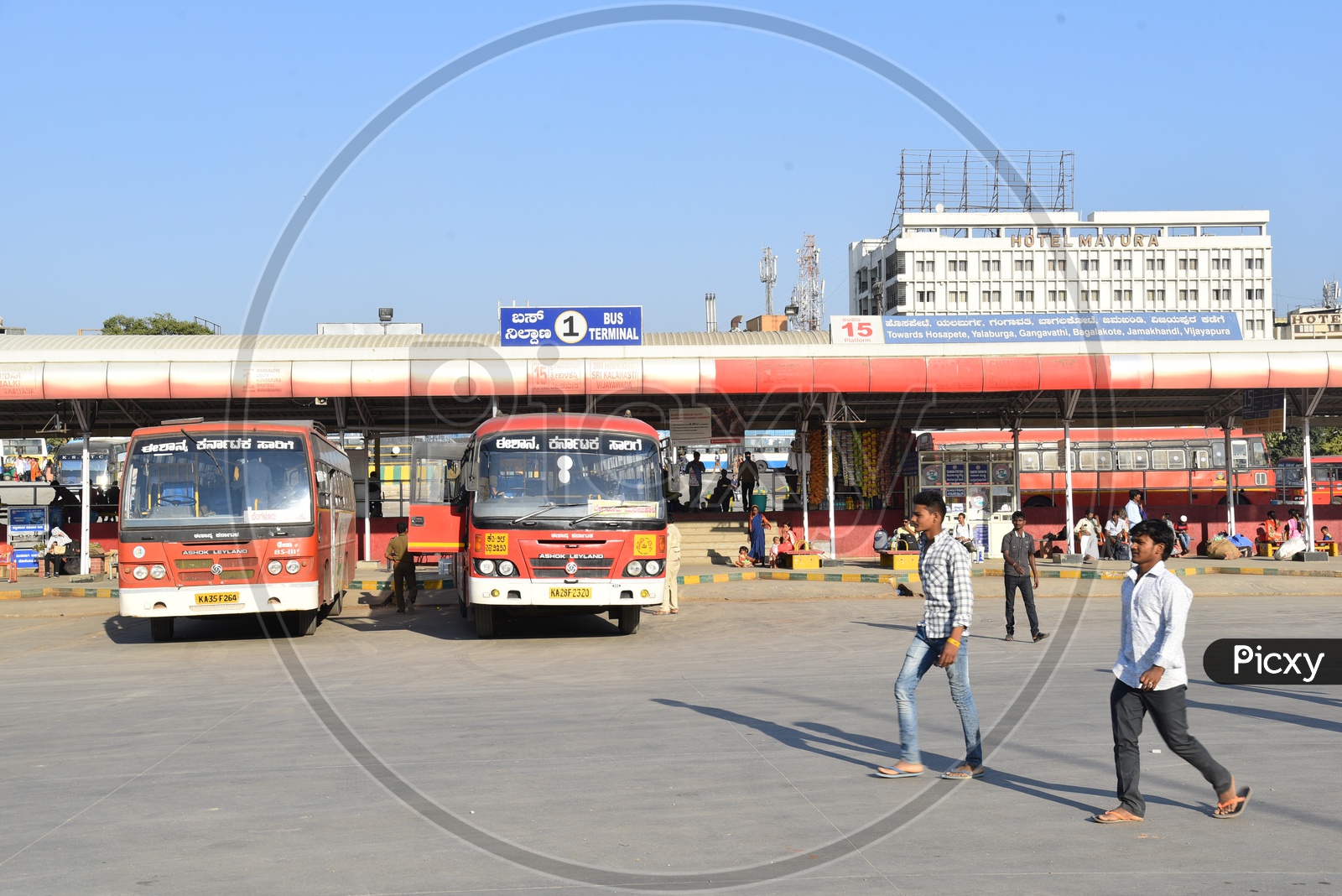 NEKRTC buses at bus terminal 1 and platform 15 in Majestic bus station, Bangalore
