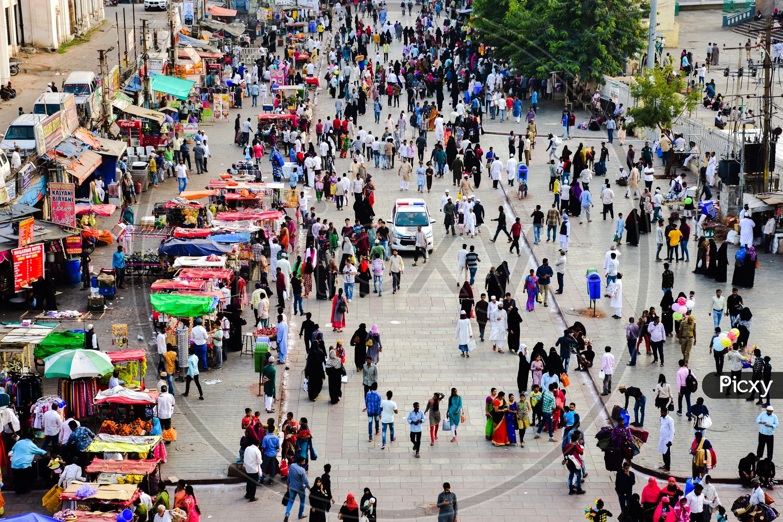 Aerial View Of  Street Vendors and People On the Streets Around  Charminar