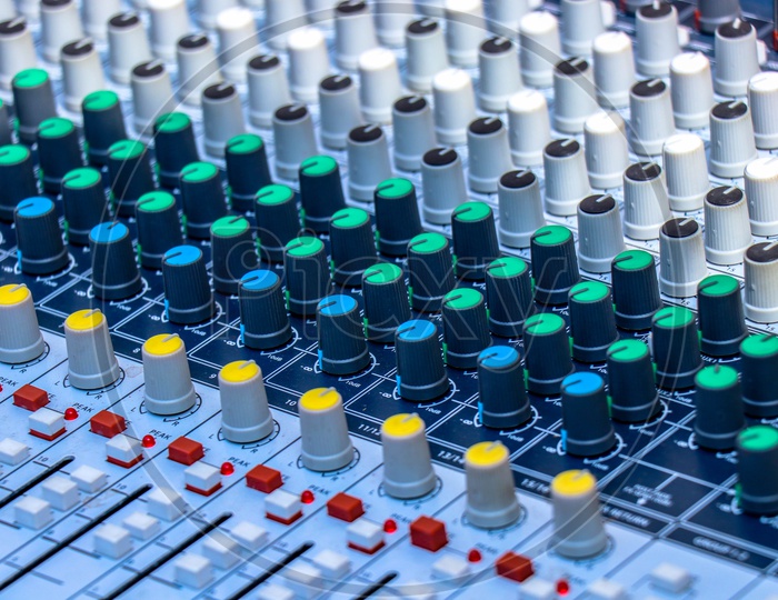 Sound Mixing Amplifier buttons closeup or Audio Analog Mixer Buttons